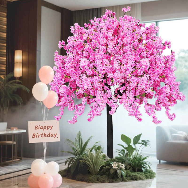 The artificial pink flower tree adds a romantic atmosphere to the home space