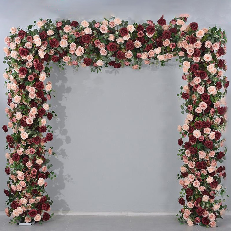 Red champagne-colored rose arch wedding celebration floral decoration