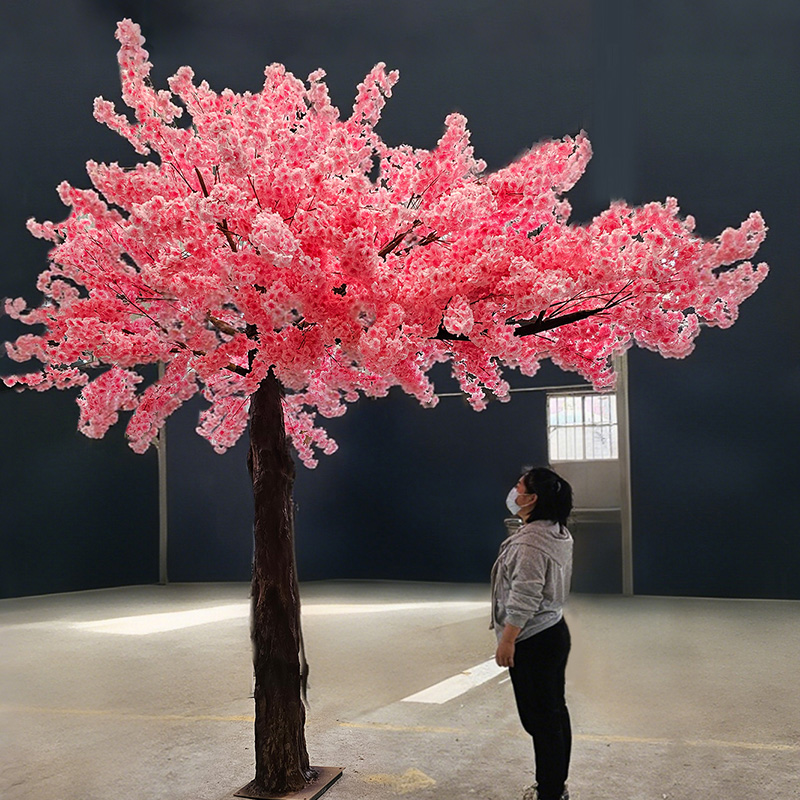 High-fidelity cherry blossom trees are popular check-in decorations, artificial trees for shopping malls and hotel window displays, and realistic flower trees